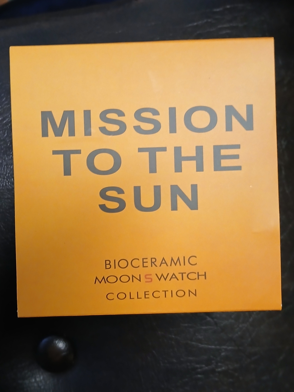 Omega Yellow and White Speedmaster Chronograph Watch